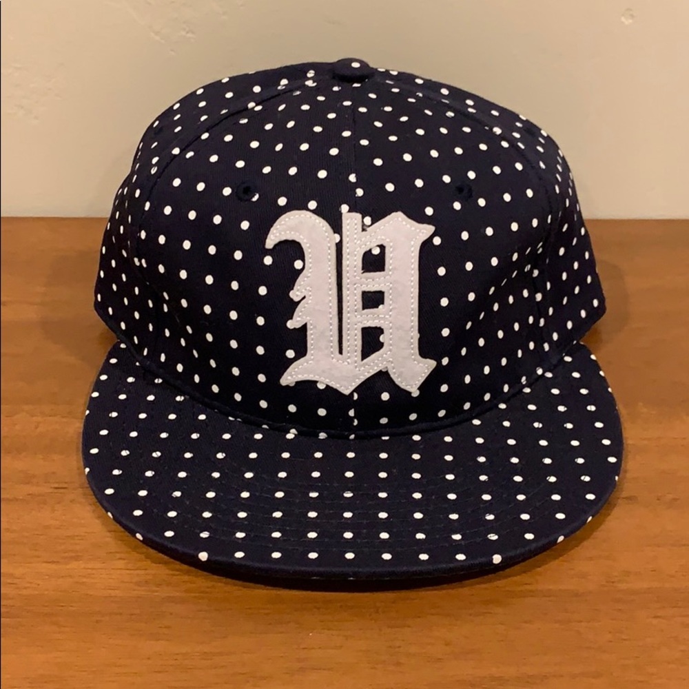 Undefeated flat brim hat with leather strap